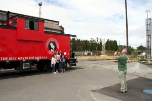 Posing for photos in front of the beautiful GN painted caboose